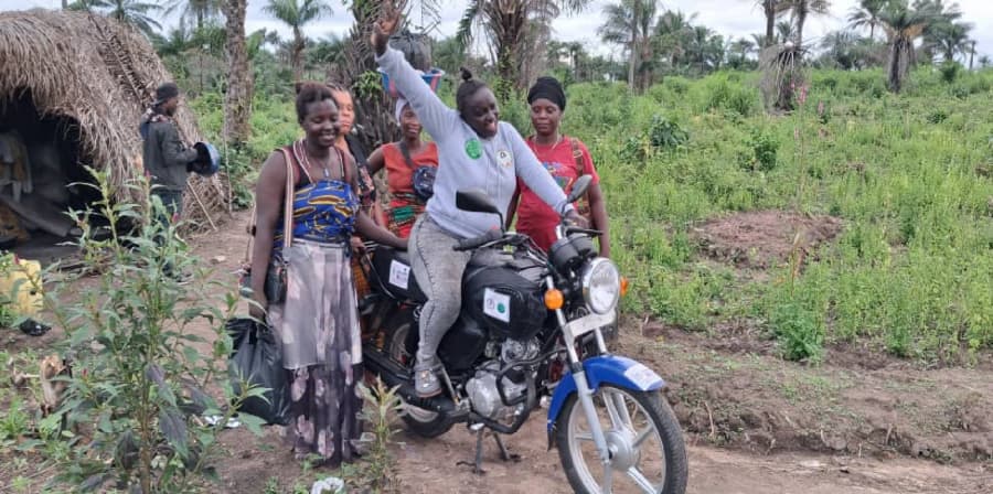Mansaray celebrates the new motorbike